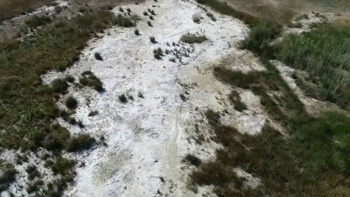 Close aerial view of the white salt ground of the Kaimbwe pan